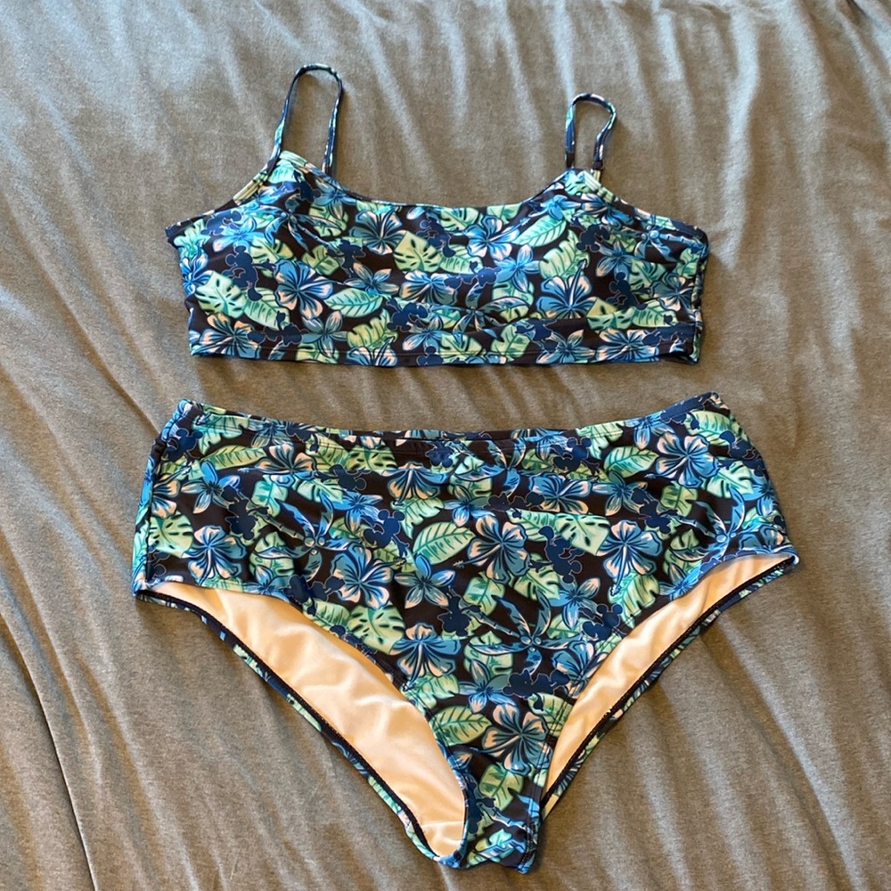Disney brand two piece bathing suit, with Minnie and Mickey Mouse detail.